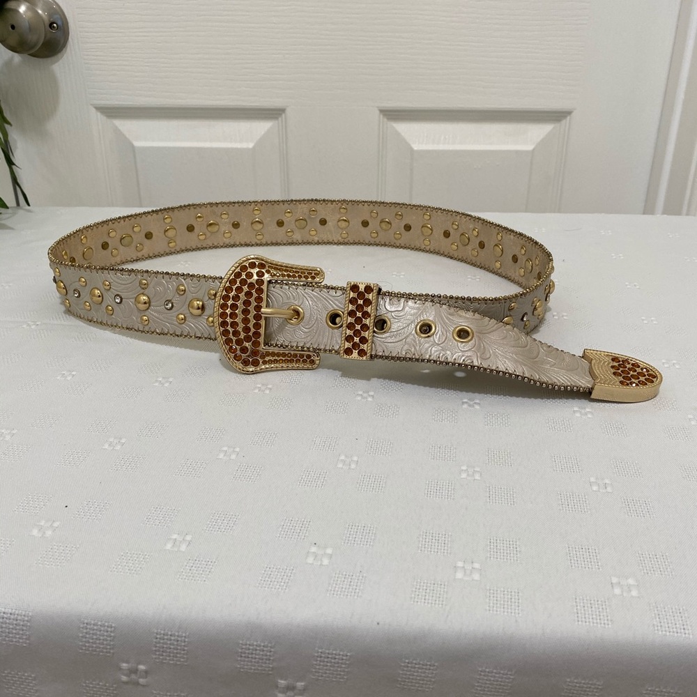 Beige crystal buckel and metal studs